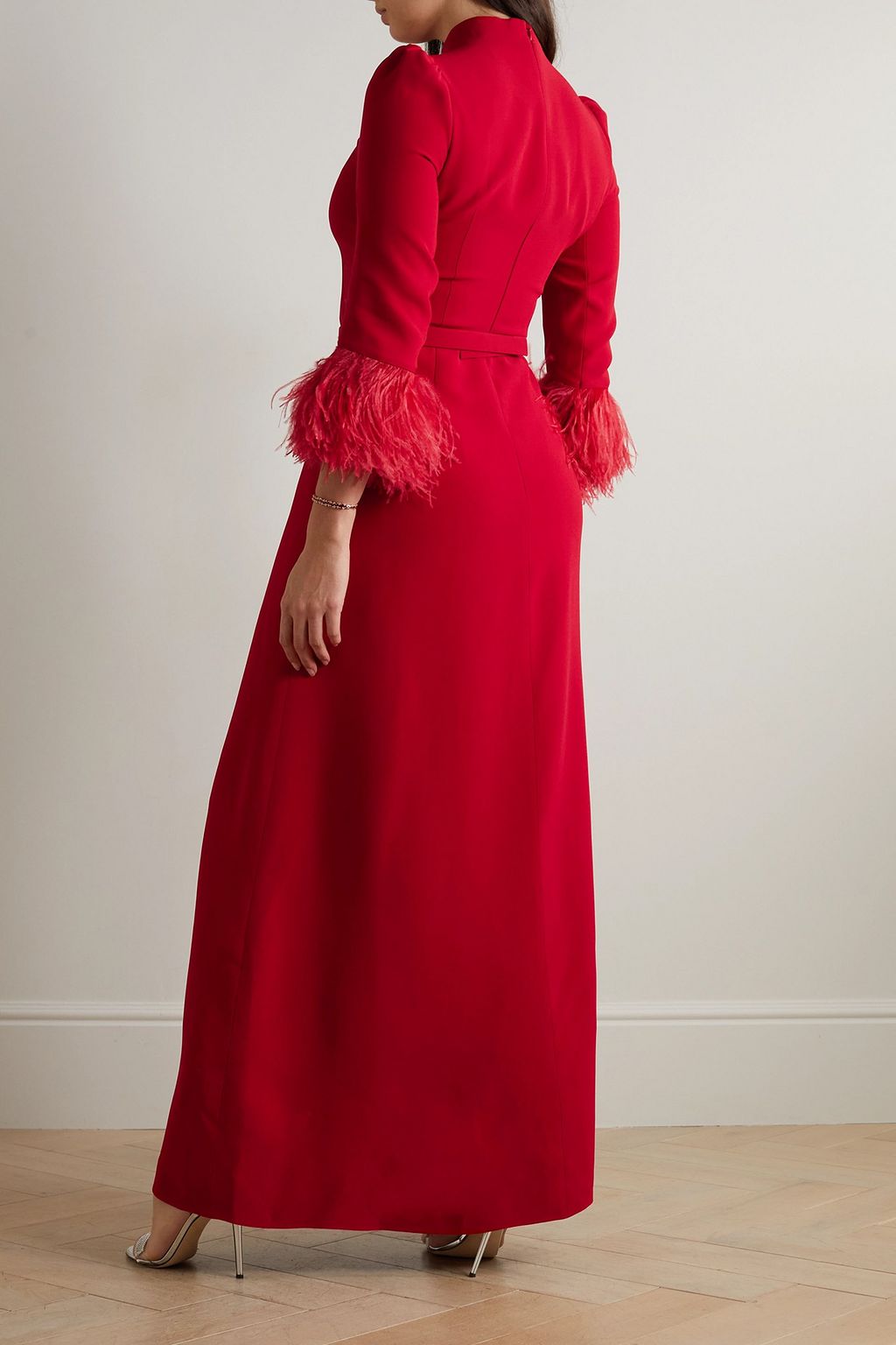 ANDREW GN Belted embellished feather-trimmed crepe gown