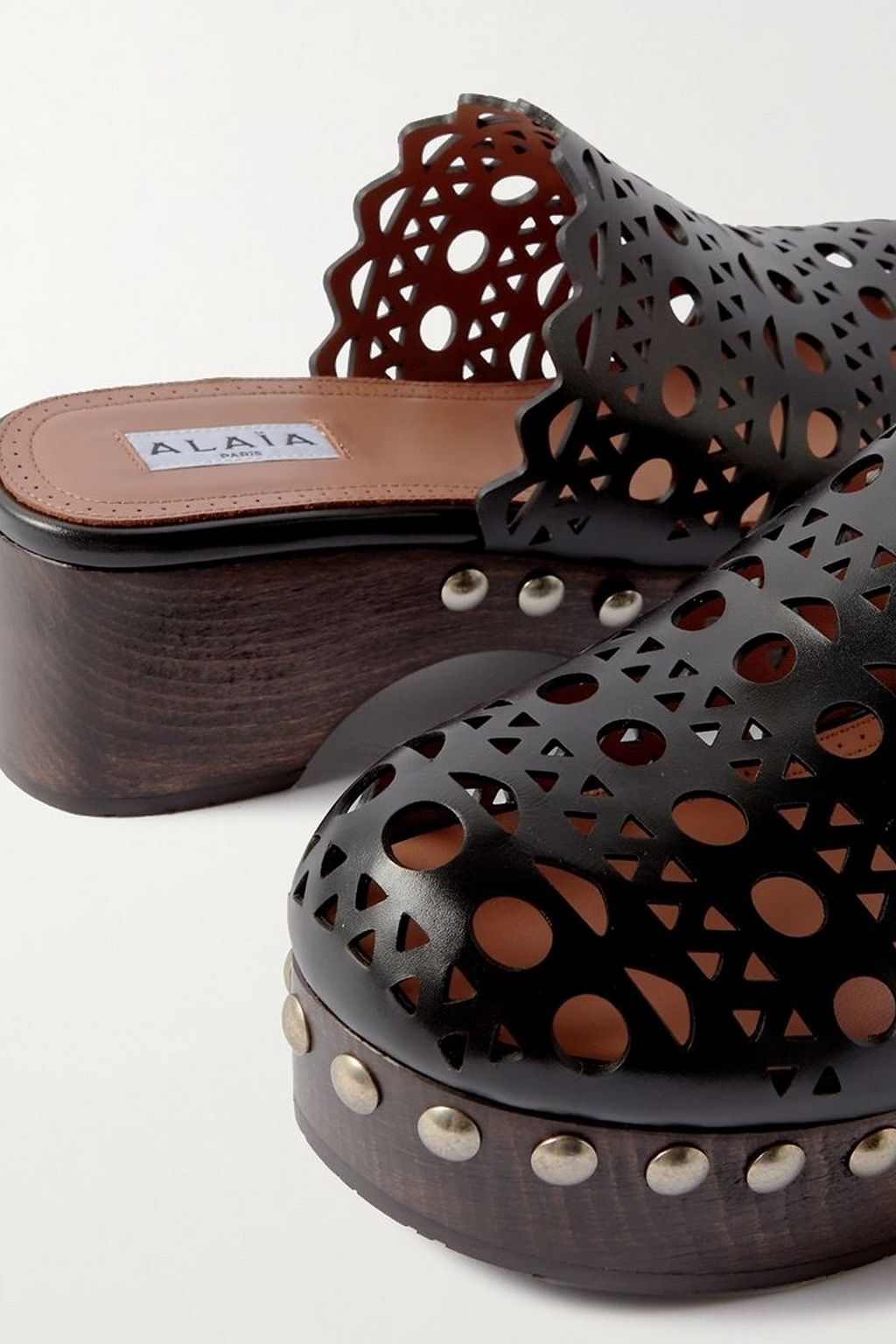 ALAÏA 60 studded laser-cut leather platform clogs
