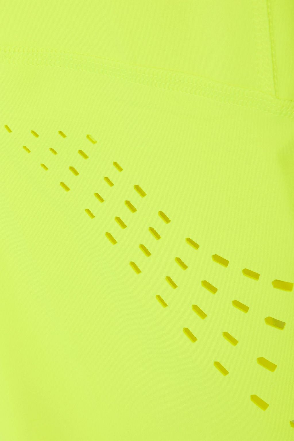 ADIDAS BY STELLA MCCARTNEY بنطلون ضيق نيوني من نسيج مرن مخرّم