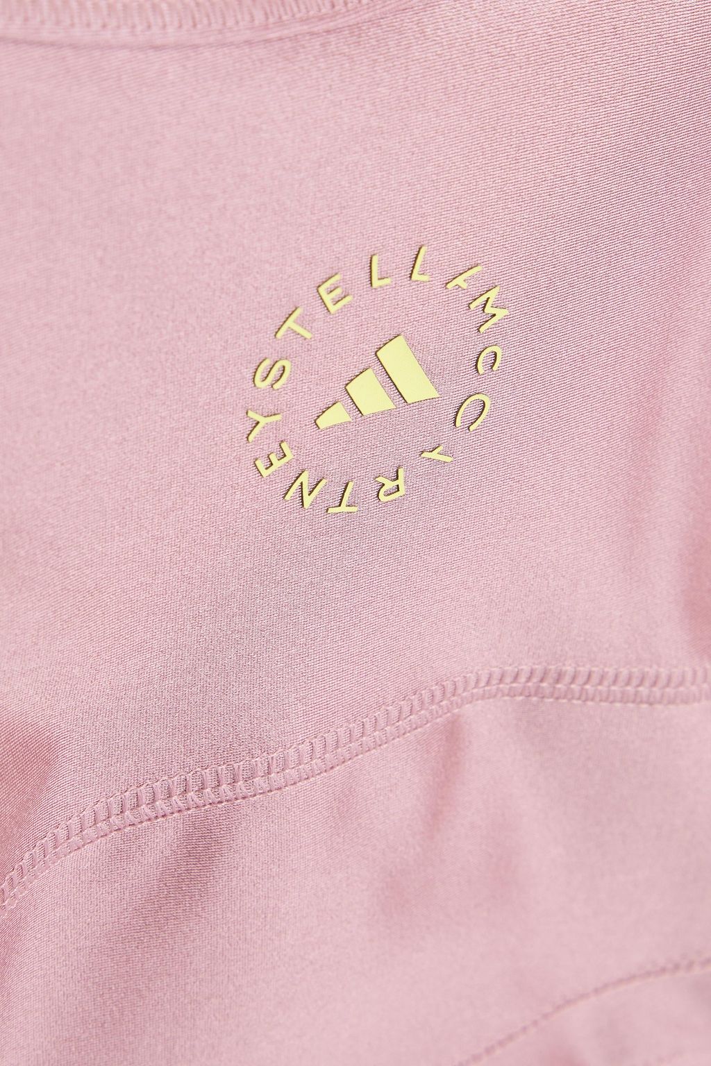 ADIDAS BY STELLA MCCARTNEY بلوزة قصيرة من نسيج مطاط مزينة بفتحات