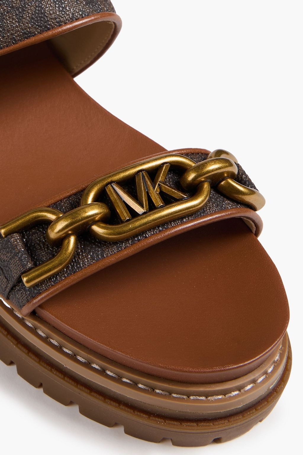 MICHAEL MICHAEL KORS صندل "كايلي" من الجلد بملمس نافر بتصميم مزركش مزود بحزام خلفي
