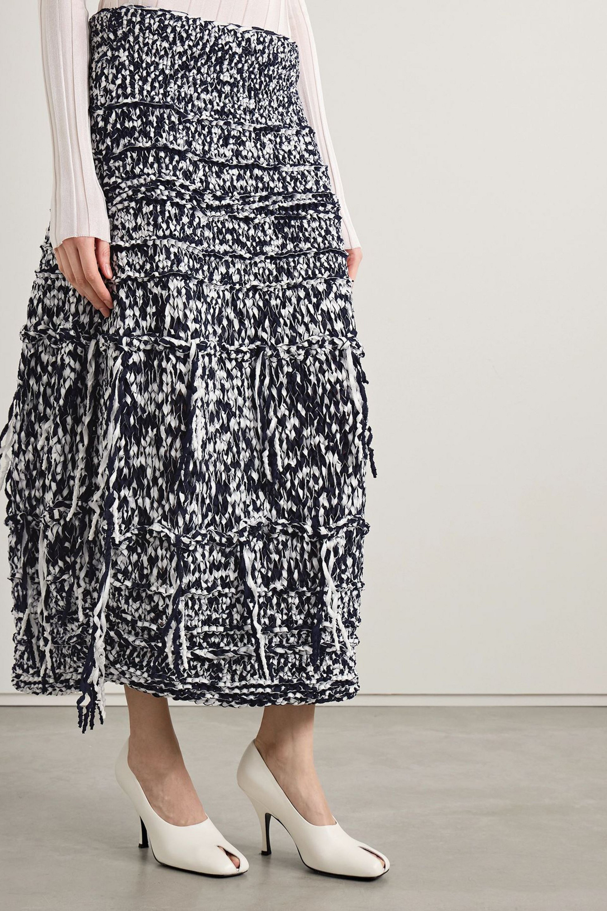 KHAITE Inna fringed cotton-blend midi skirt