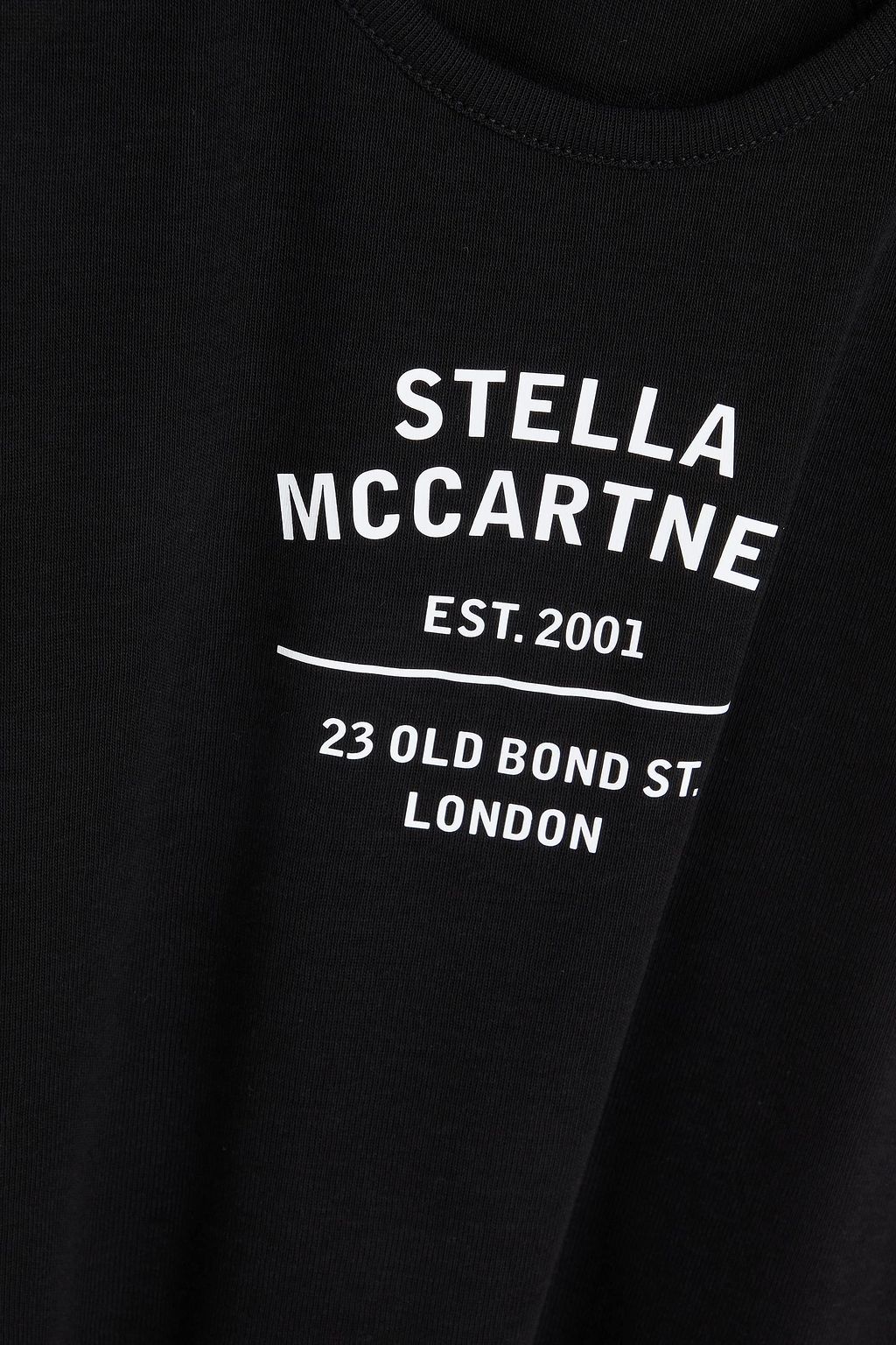 STELLA MCCARTNEY تي شيرت بدون أكمام من الجيرسي المصنوع من مزيج من القطن واللايوسيل المضلّع مزين بطبعة شعار العلامة