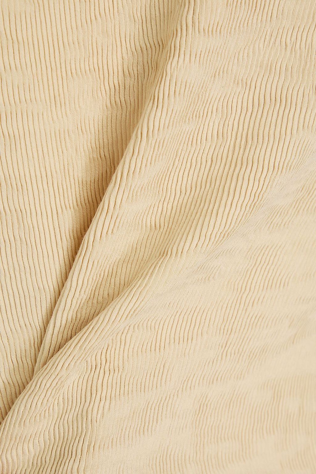 BY MALENE BIRGER بلوزة "سيمون" مزيج قماش إيكوفيرو™ وقماش بليسيه بقصّة غير متماثلة