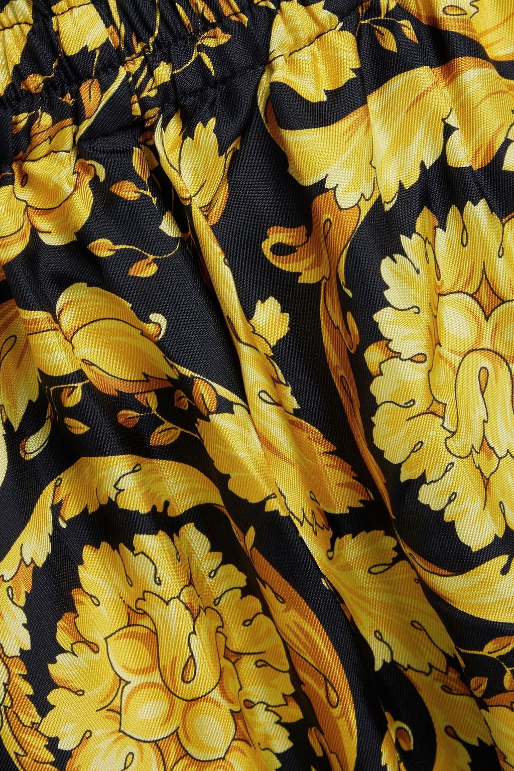 VERSACE بنطال بيجاما من حرير تويل مزين بطبعات