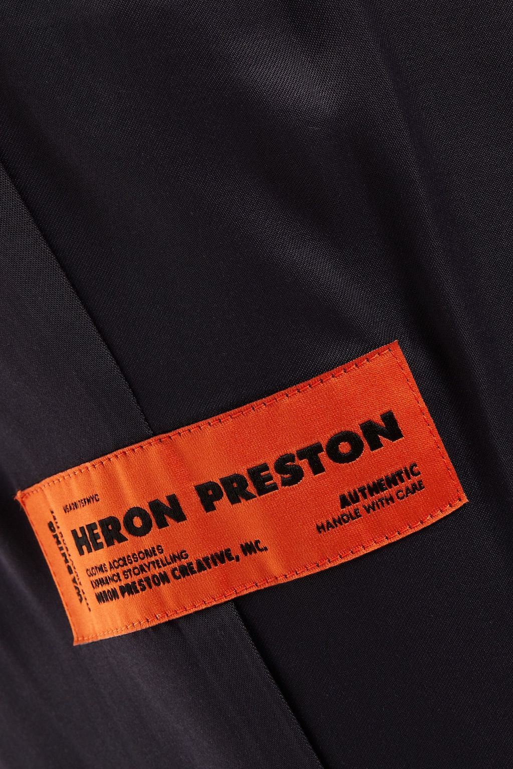 HERON PRESTON Appliquéd pleated satin tapered pants