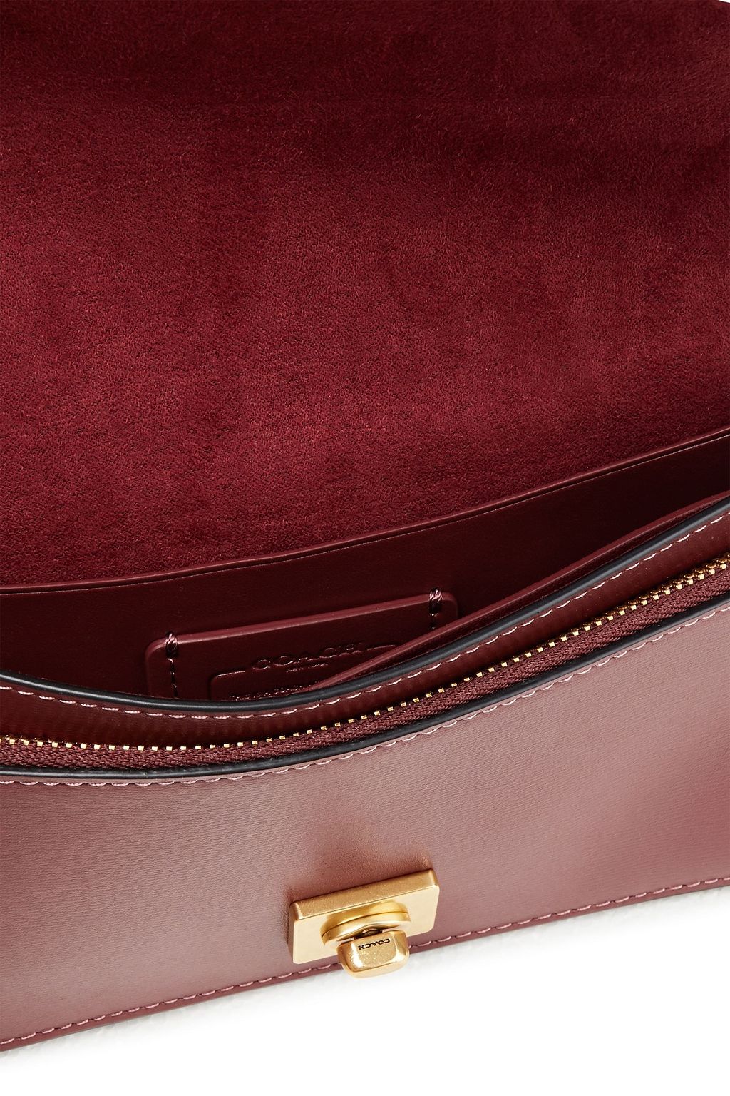 COACH Woven leather clutch