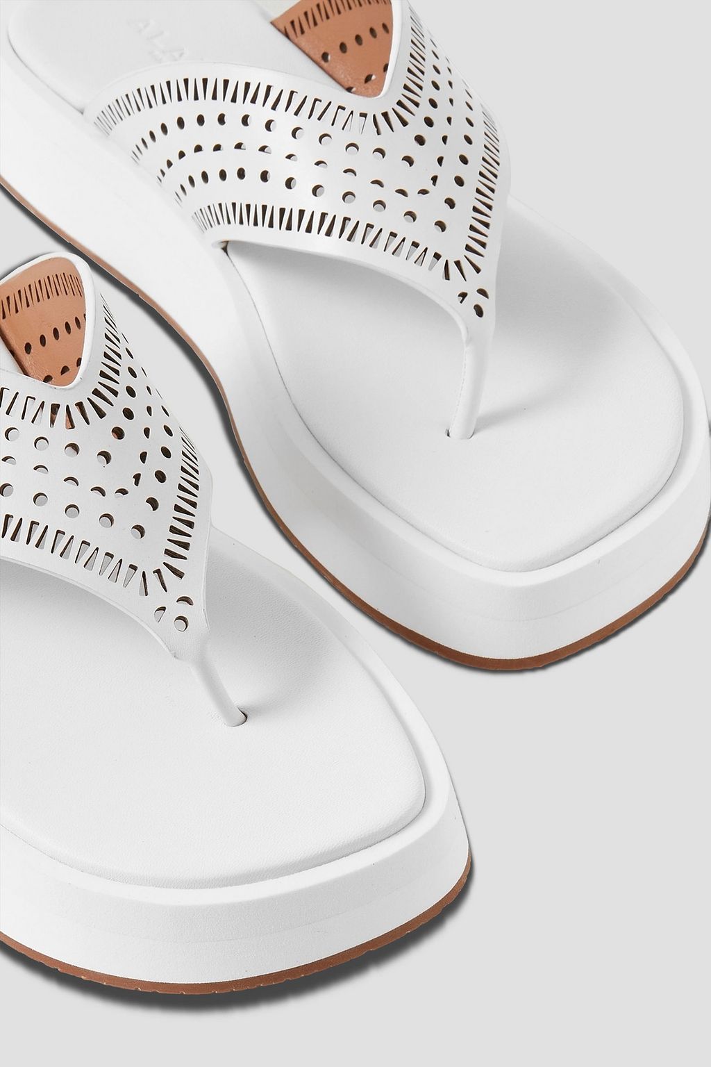 ALAÏA 40 Zehensandalen aus lasergeschnittenem Leder mit Plateau