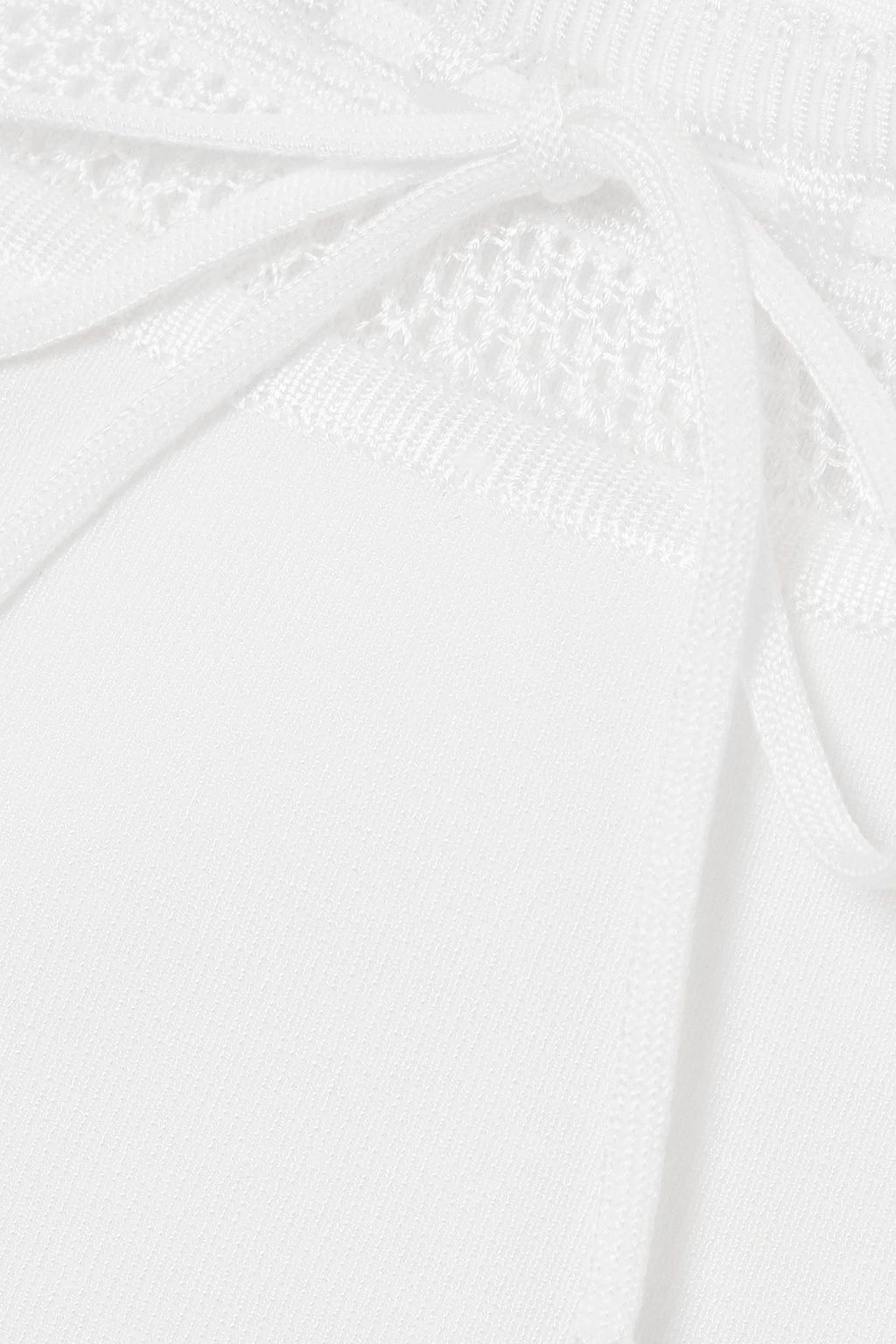 ALAÏA ストレッチニット クロップドトップス リボン付き