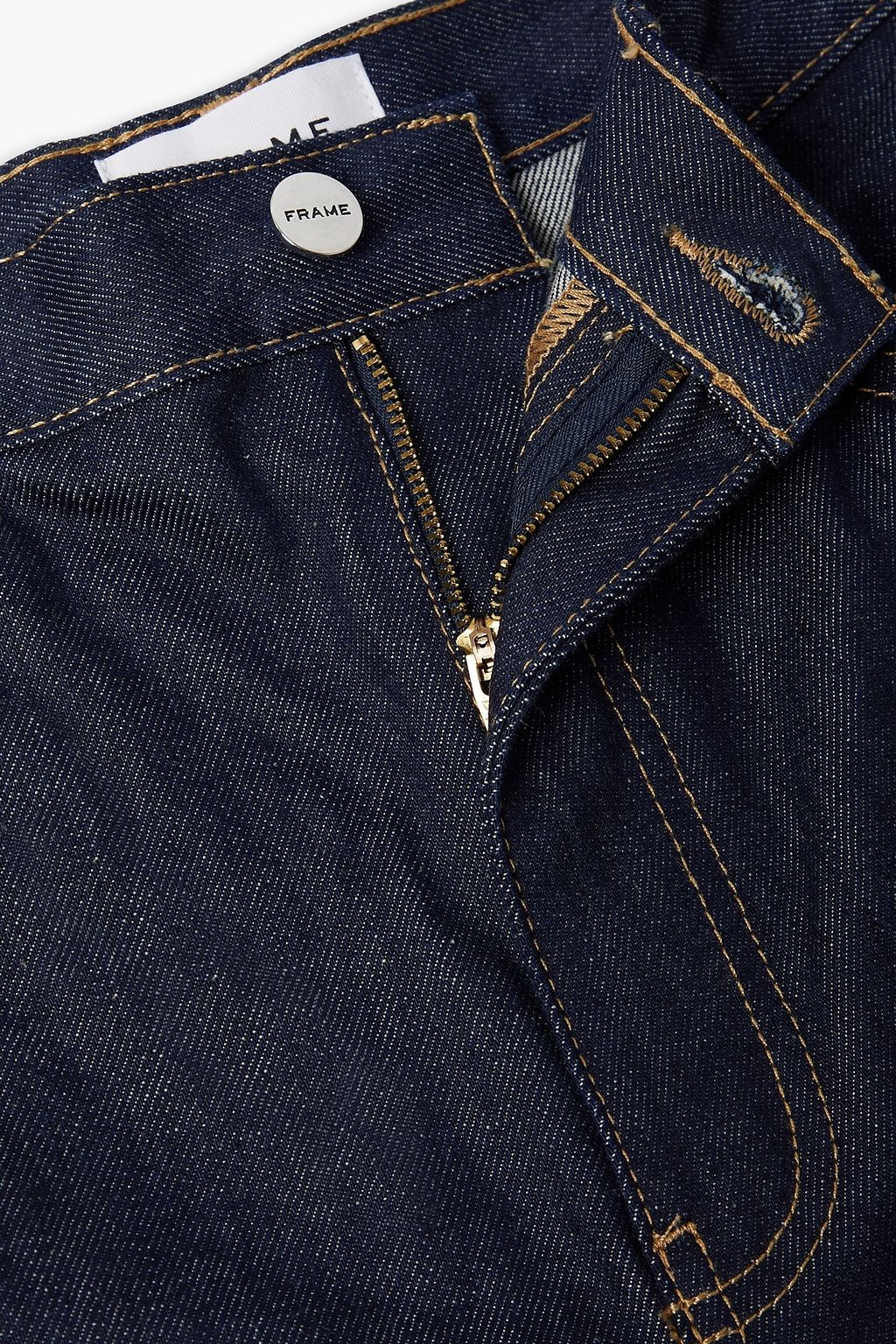 FRAME Cropped faded high-rise tapered jeans