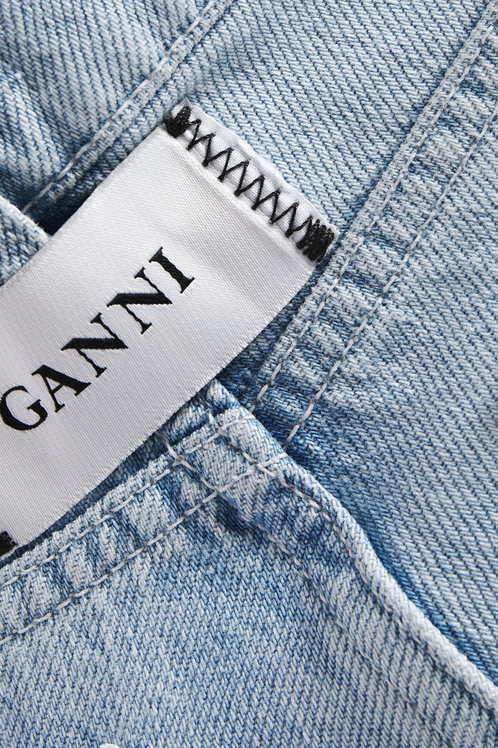 GANNI Fringed mid-rise straight-leg jeans