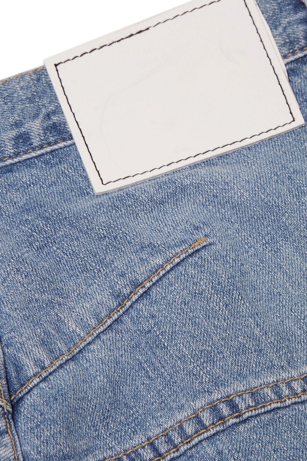 BASSIKE Faded high-rise tapered jeans