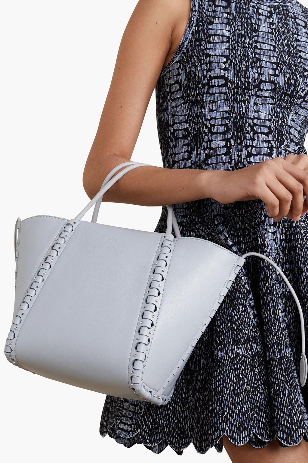 ALAÏA Le Hinge small laser-cut studded leather tote
