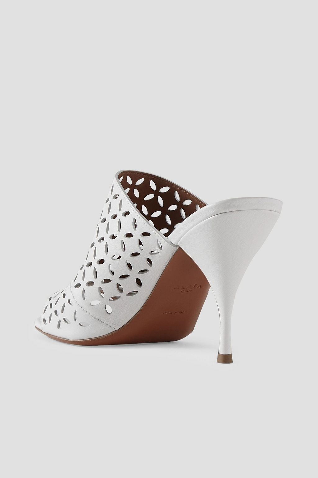 ALAÏA 90 laser-cut leather mules