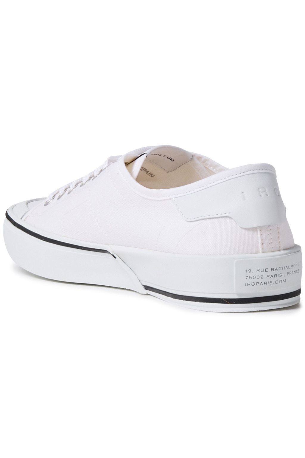 white canvas sports shoes