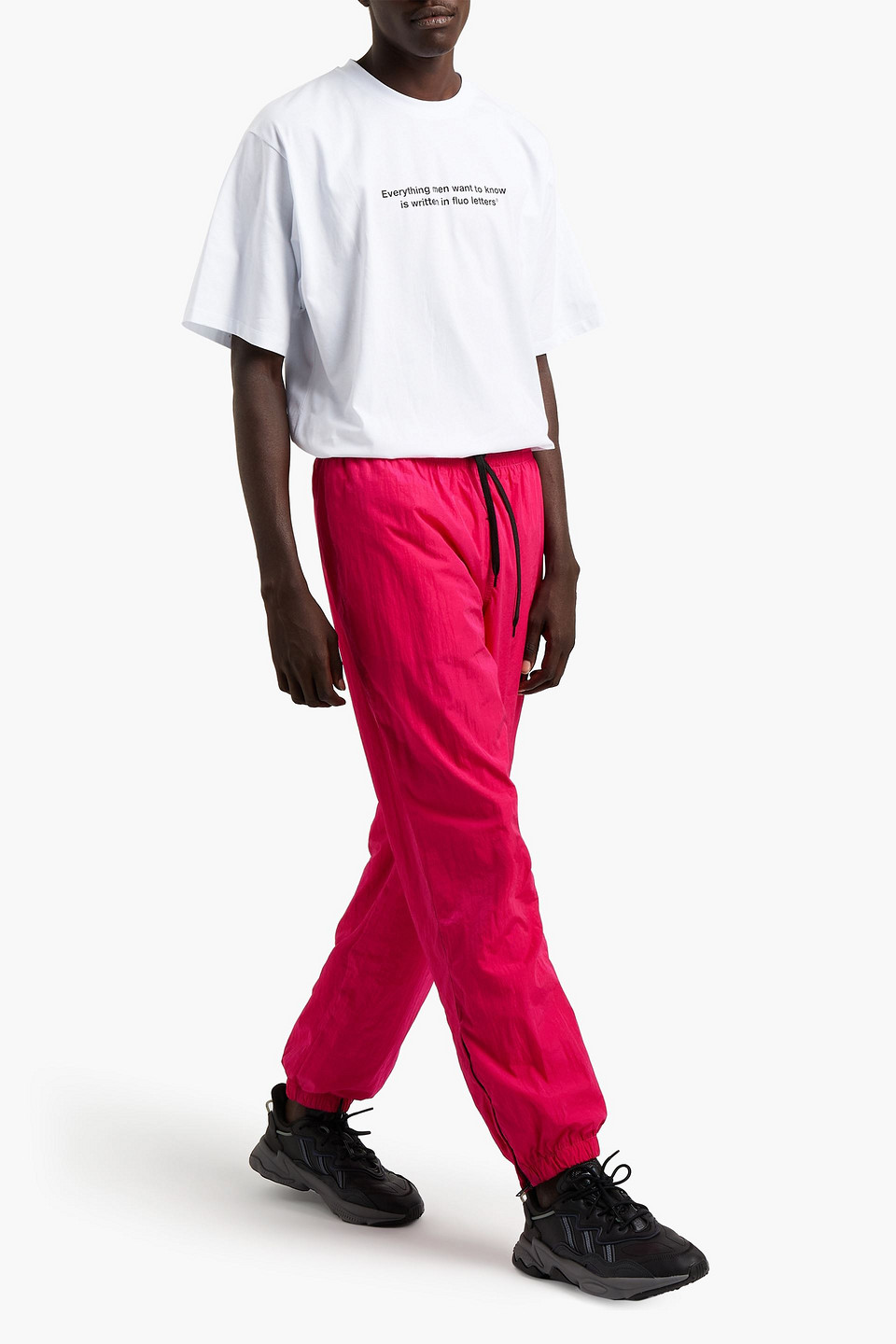 Msgm Man Tapered Printed Crinkled Shell Trousers In Pink