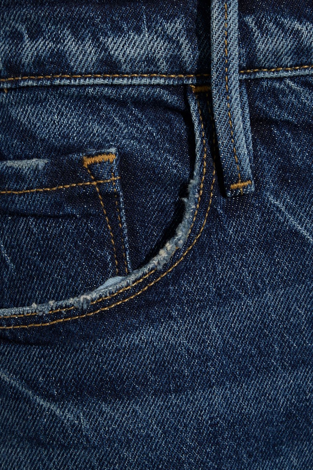 FRAME بنطلون جينز بقصة أرجل ضيقة وخصر مرتفع بتصميم ممزق