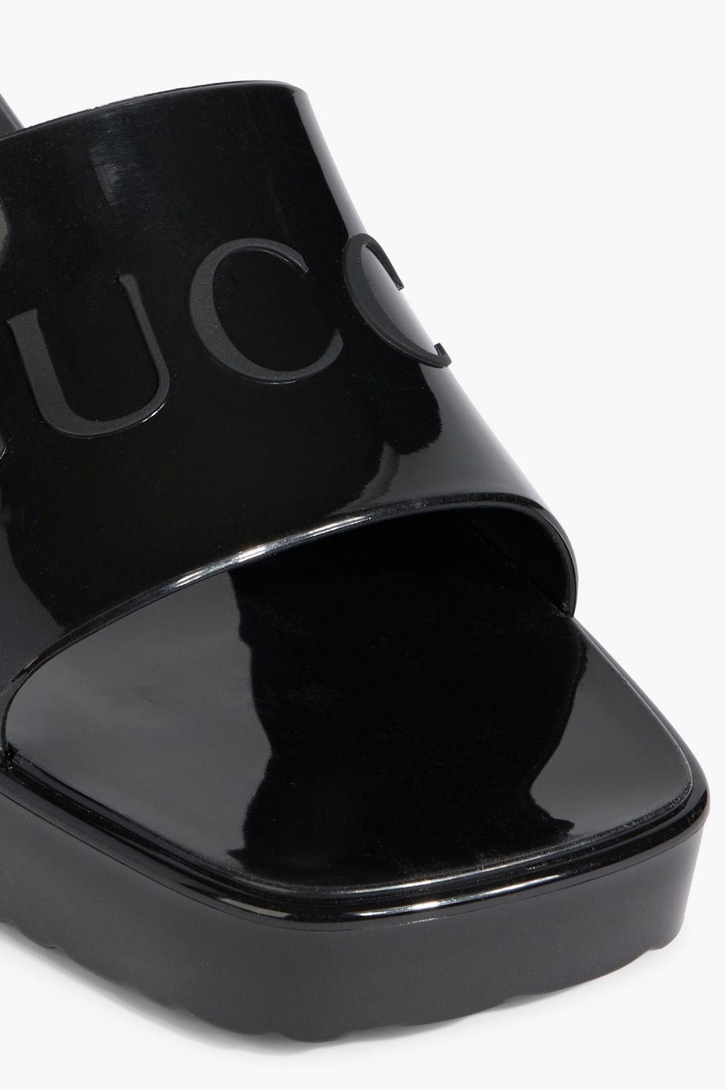 GUCCI Embossed rubber mules