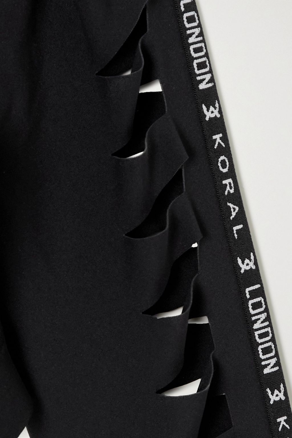 KORAL + David Koma Jasper cropped laser-cut stretch-jersey top