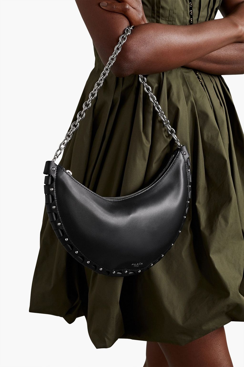 ALAÏA Demi Lune laser-cut studded leather shoulder bag