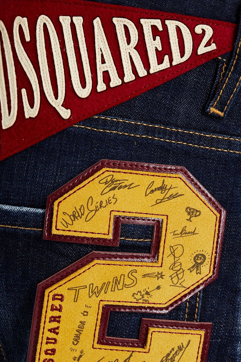 DSQUARED2 Skinny-fit appliquéd distressed faded denim jeans
