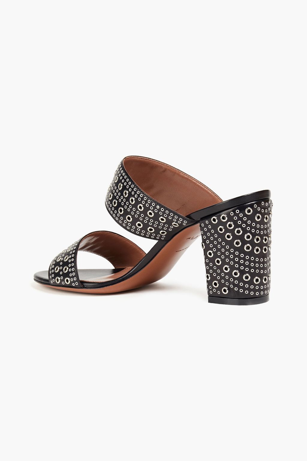ALAÏA Mules aus Leder mit Ösenverzierung