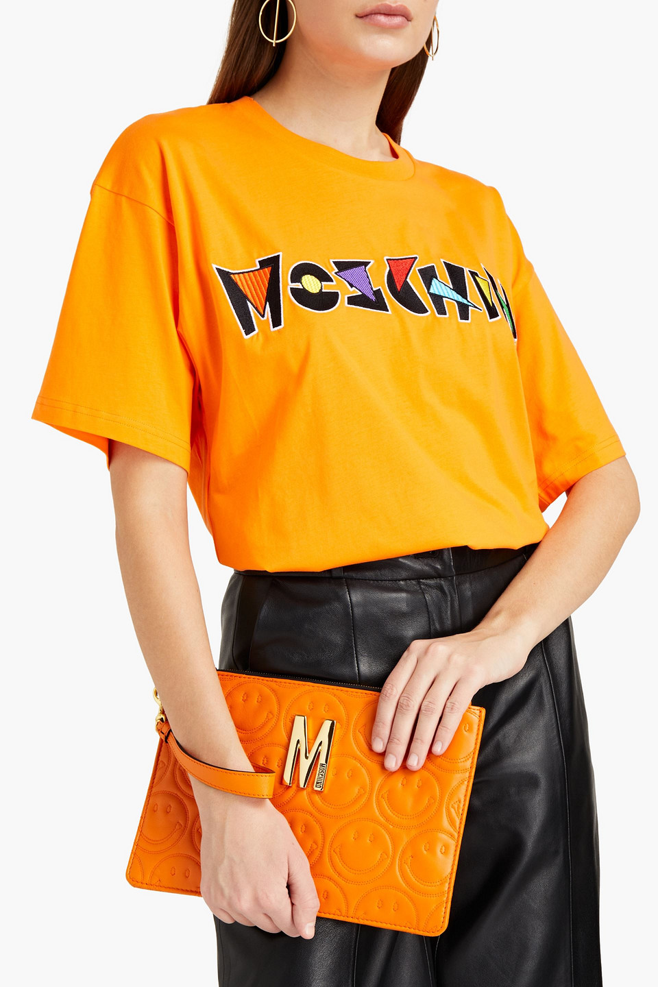 Moschino Quilted Leather Clutch In Orange