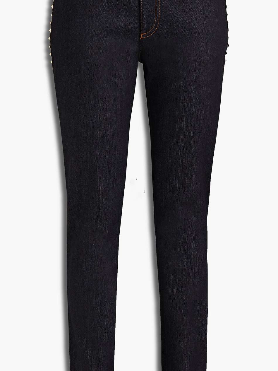 studded mid-rise skinny jeans