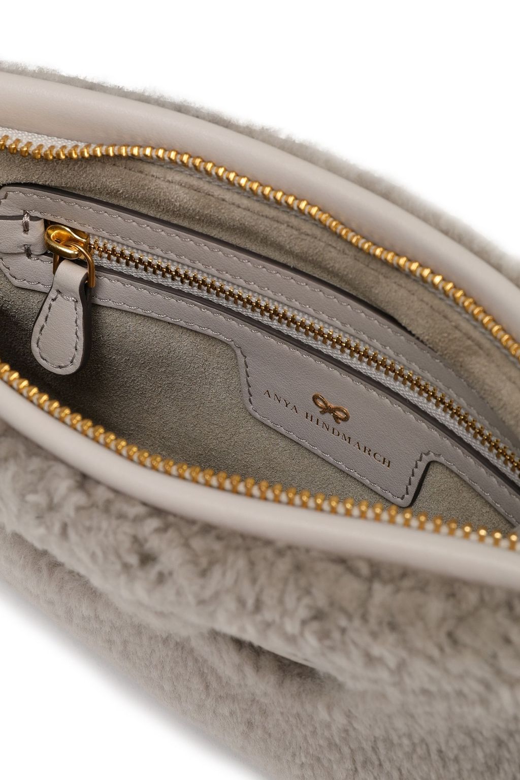 ANYA HINDMARCH Embossed leather-trimmed shearling pouch