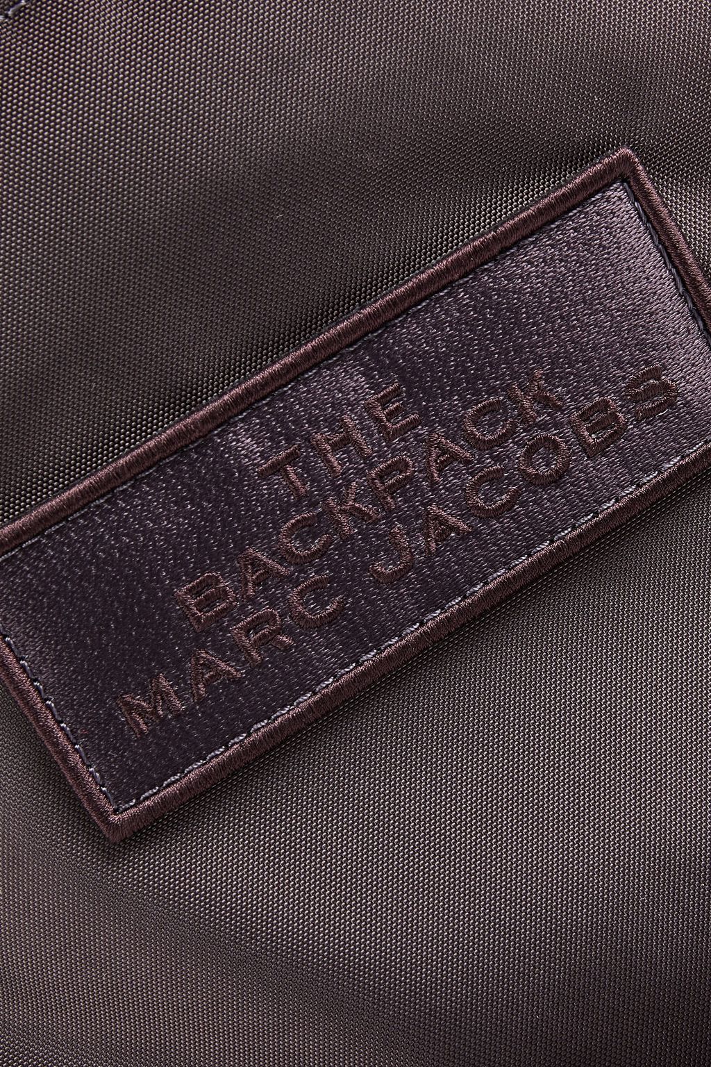 MARC JACOBS Logo-appliquéd shell backpack