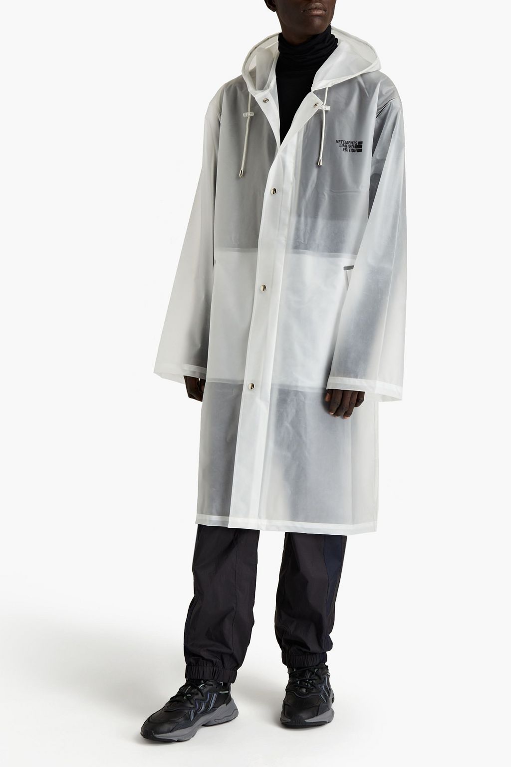 VETEMENTS Printed vinyl hooded raincoat