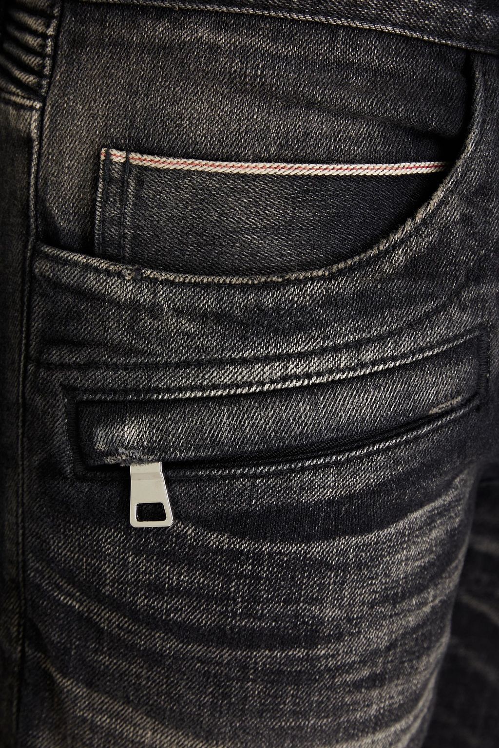BALMAIN Tapered pintucked faded denim jeans