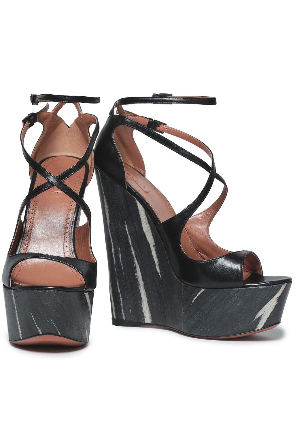 ALAÏA Leather platform wedge sandals