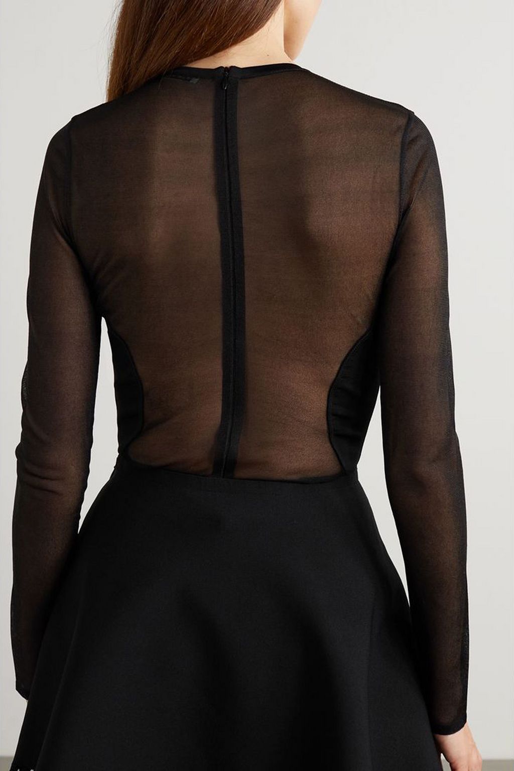 ALAÏA Paneled silk and jersey thong bodysuit