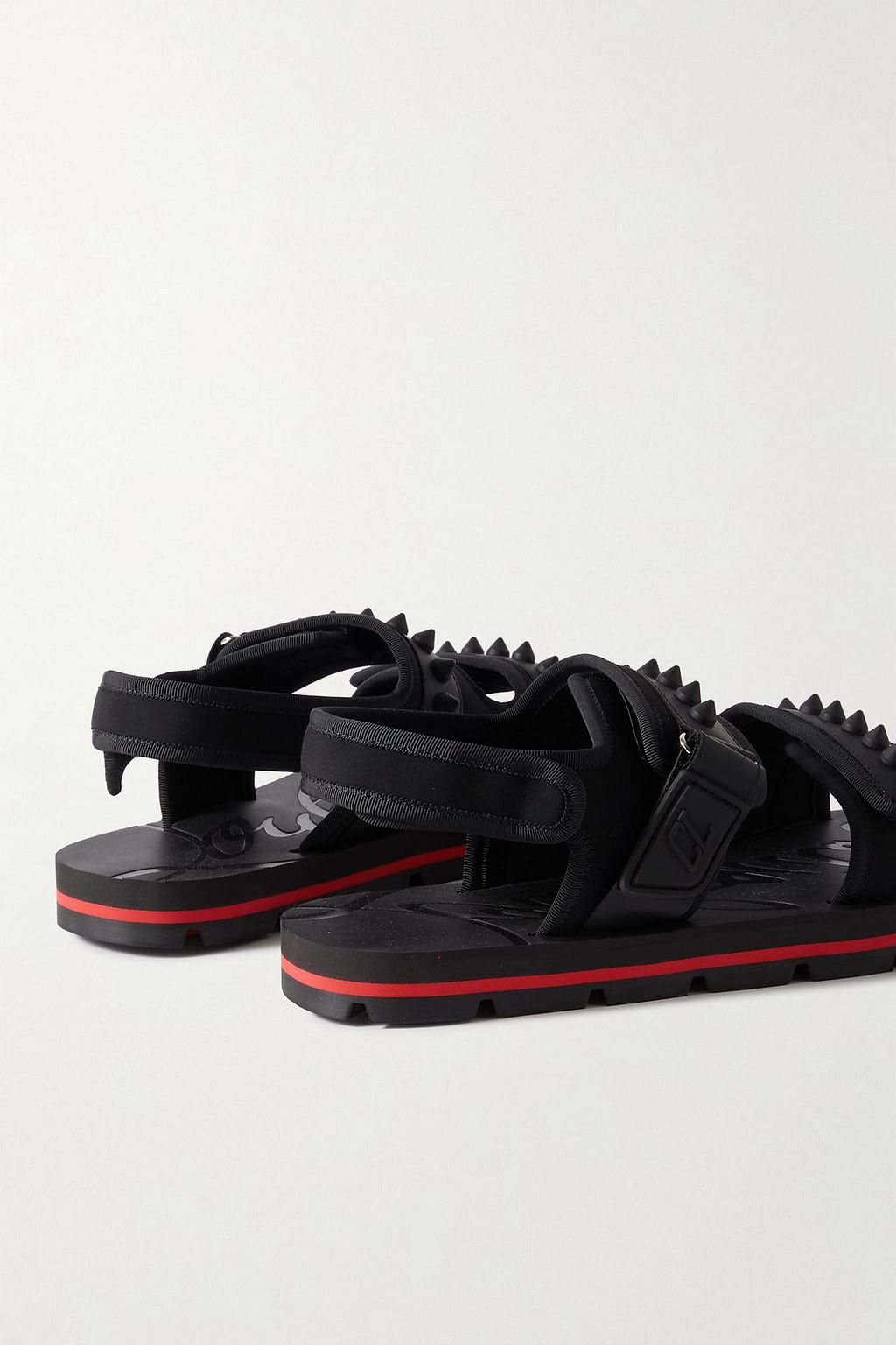 CHRISTIAN LOUBOUTIN صندل Siwa من الجلد والمطاط والنيوبرين مزين بدبابيس هرمية