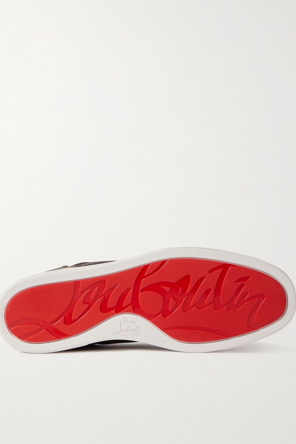 CHRISTIAN LOUBOUTIN حذاء سنيكرز Rantulow من الجاكار بطبعة التمويه والجلد