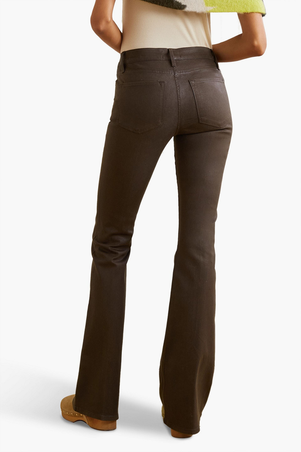 Shop Frame Le High Flare Coated Jeans In Dark Brown