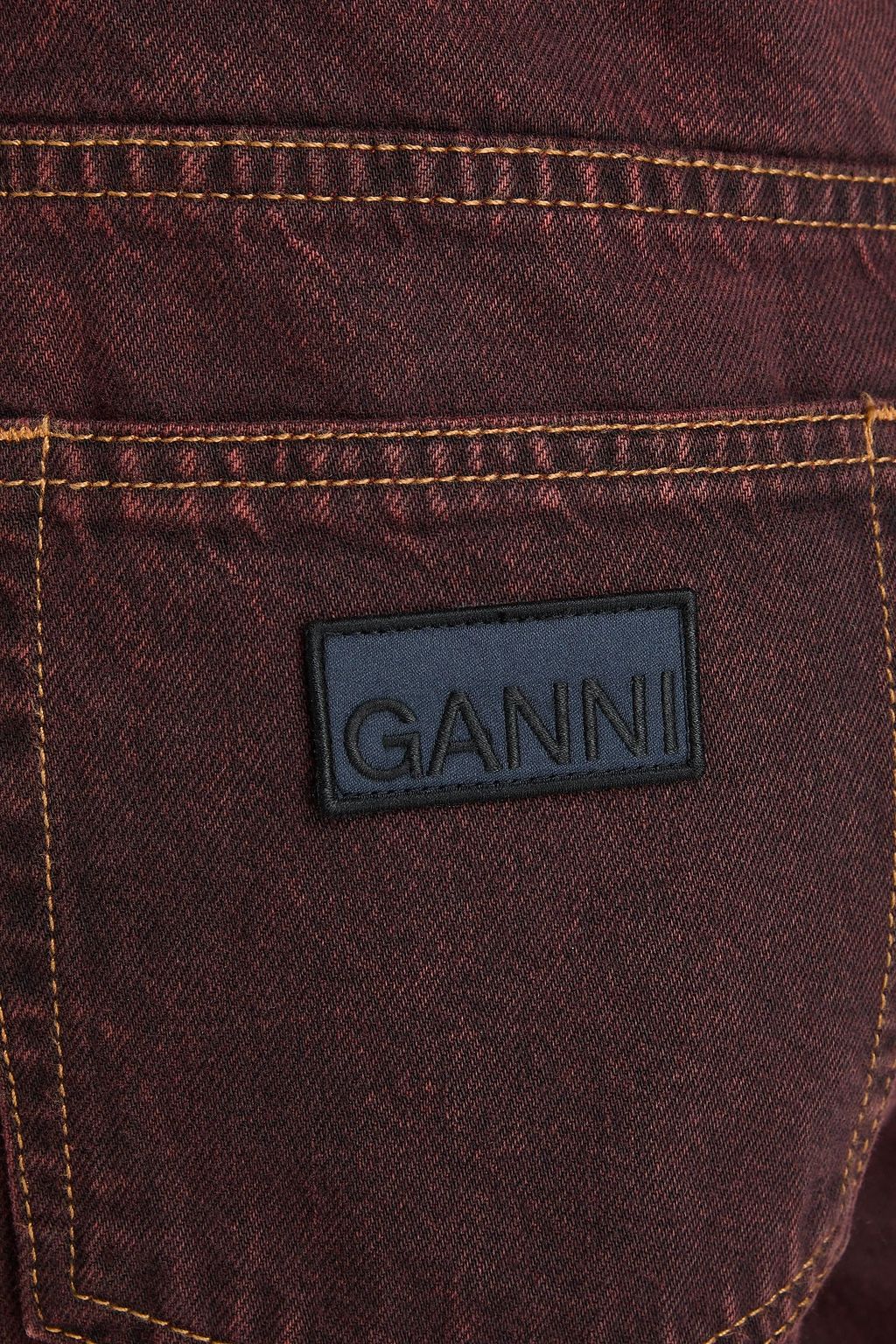 GANNI جينز بأرجل مستقيمة وبخصر عالٍ