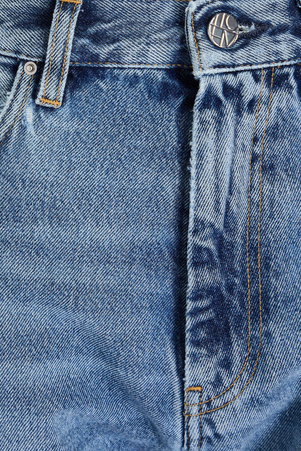 TOTEME Twisted Seam faded straight-leg jeans