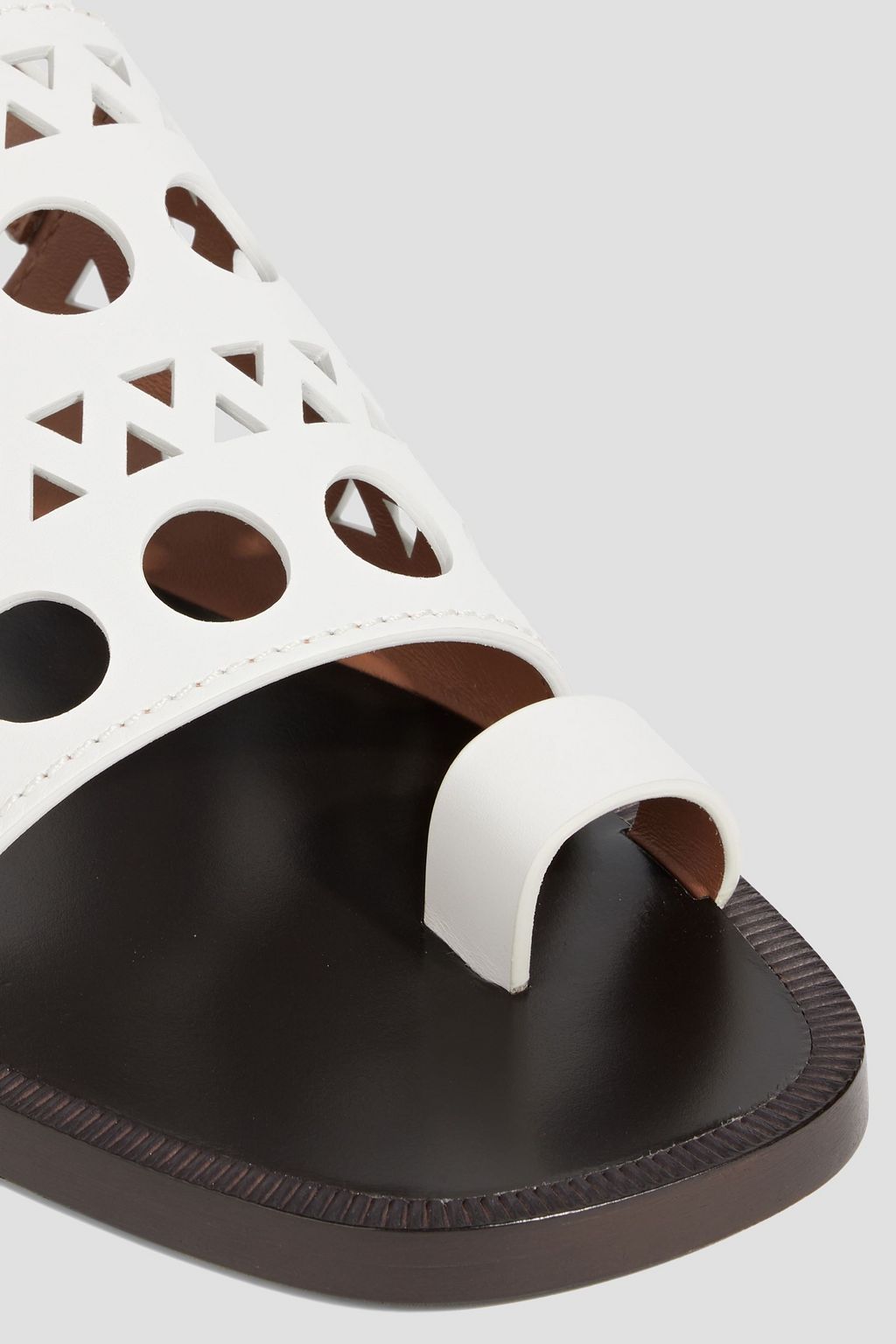 ALAÏA Laser-cut leather slingback sandals