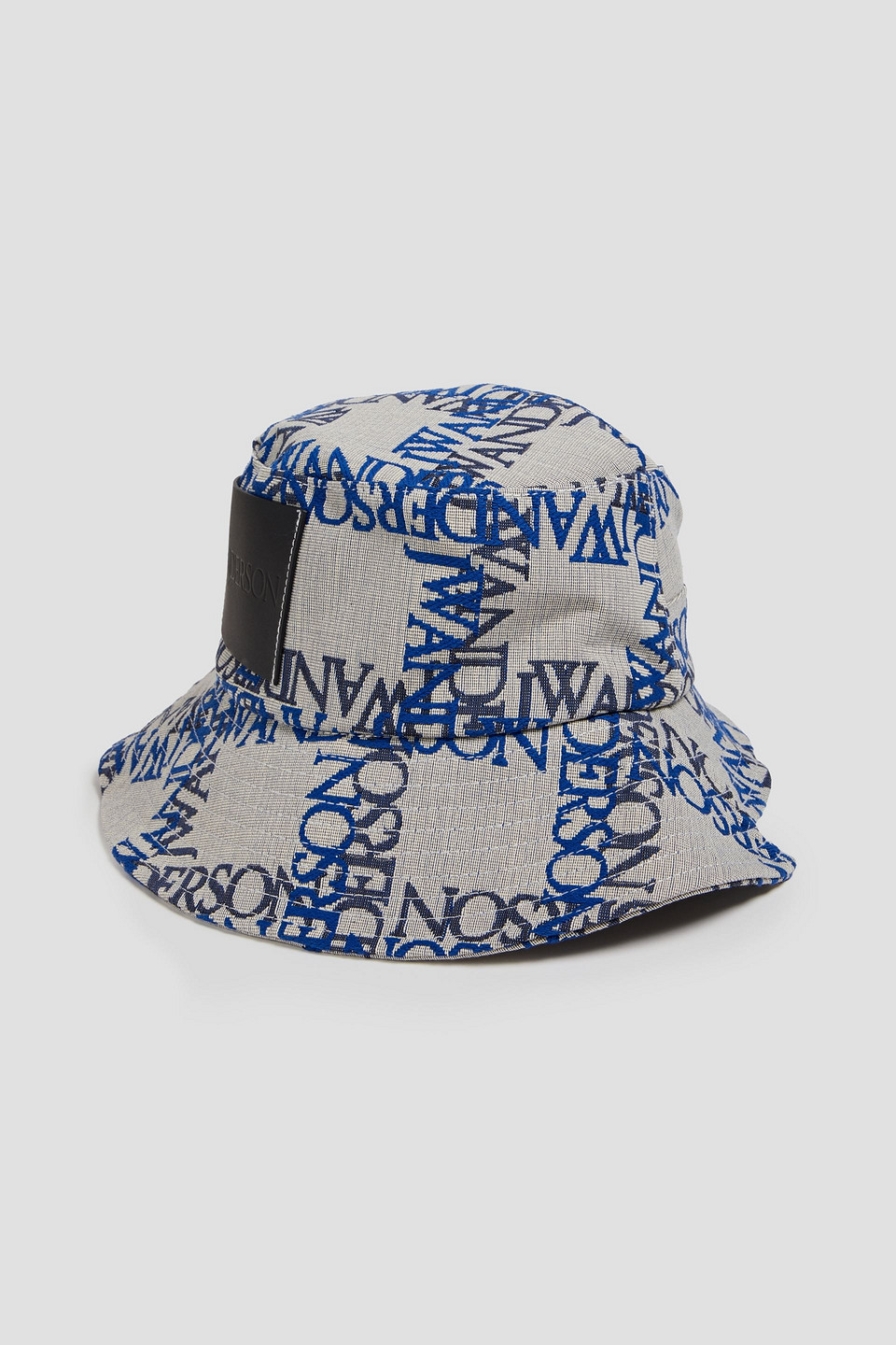 Jw Anderson Logo Patch Asymmetric Bucket Hat In Stone