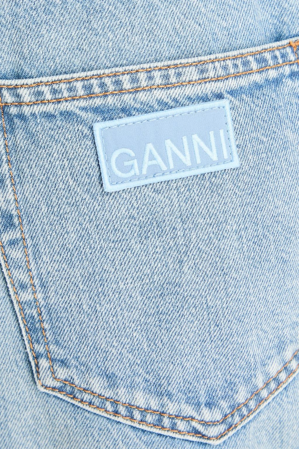 GANNI بنطال جينز بأرجل واسعة وخصر عالٍ