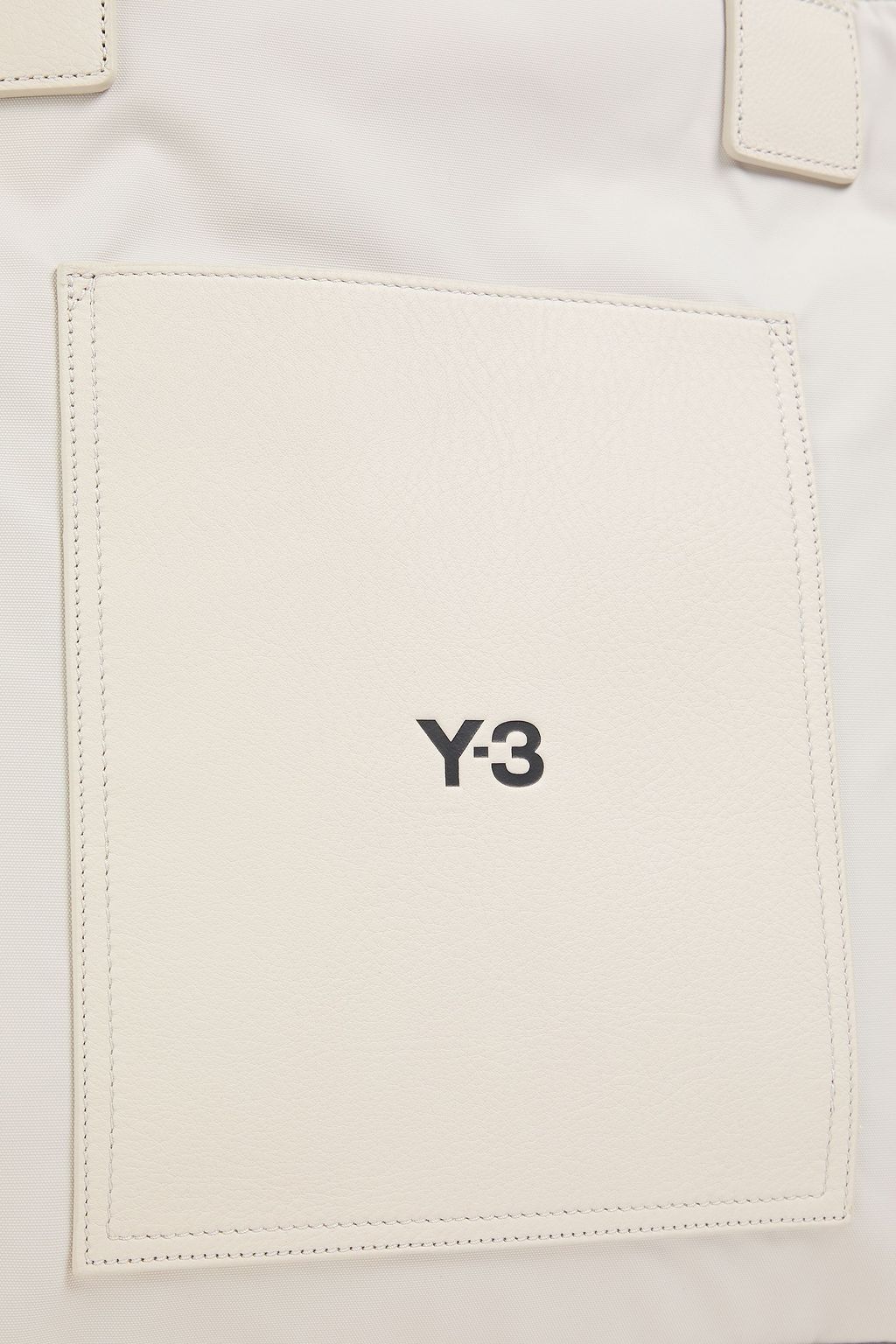 Y-3 حقيبة توت مصنوعة من قماش عازل مع حواف من الجلد