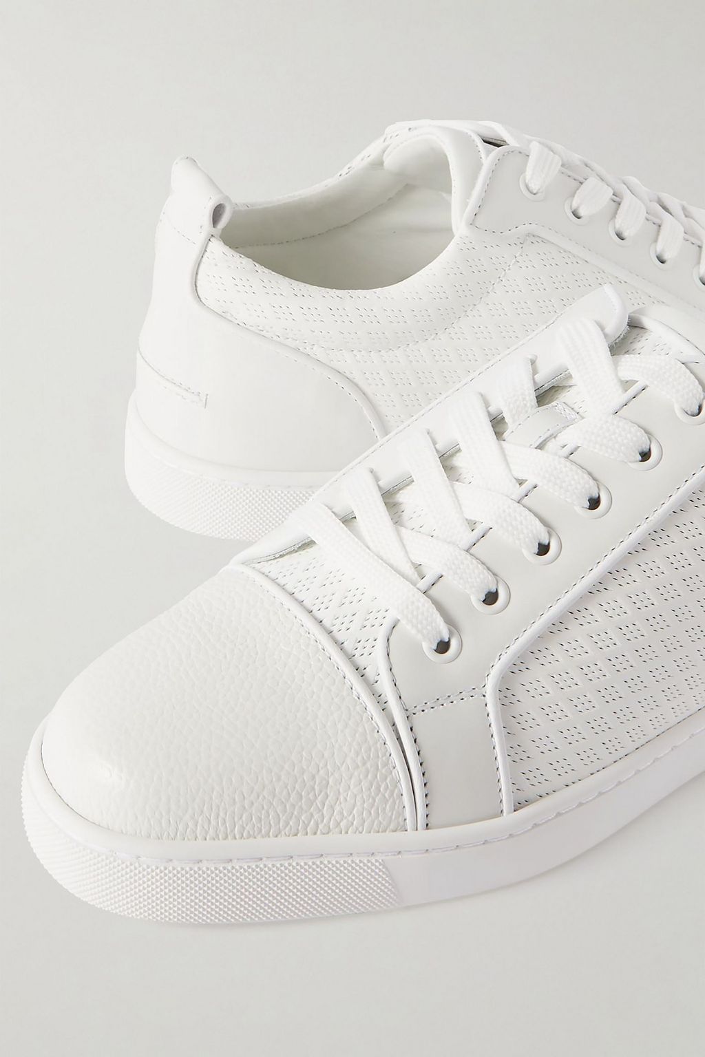 CHRISTIAN LOUBOUTIN Louis Junior Orlato perforated leather sneakers