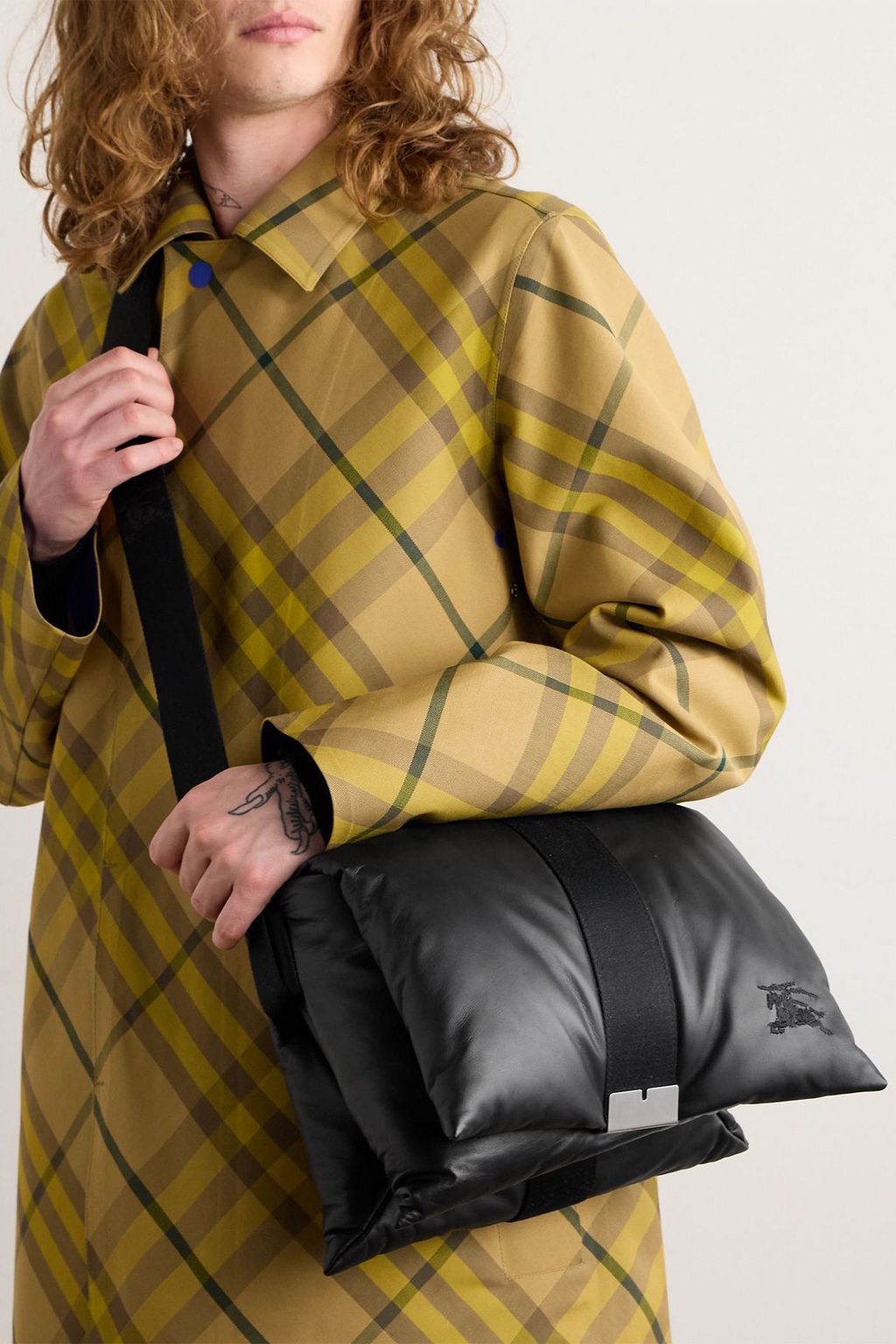 BURBERRY Logo-embroidered padded leather messenger bag | THE OUTNET