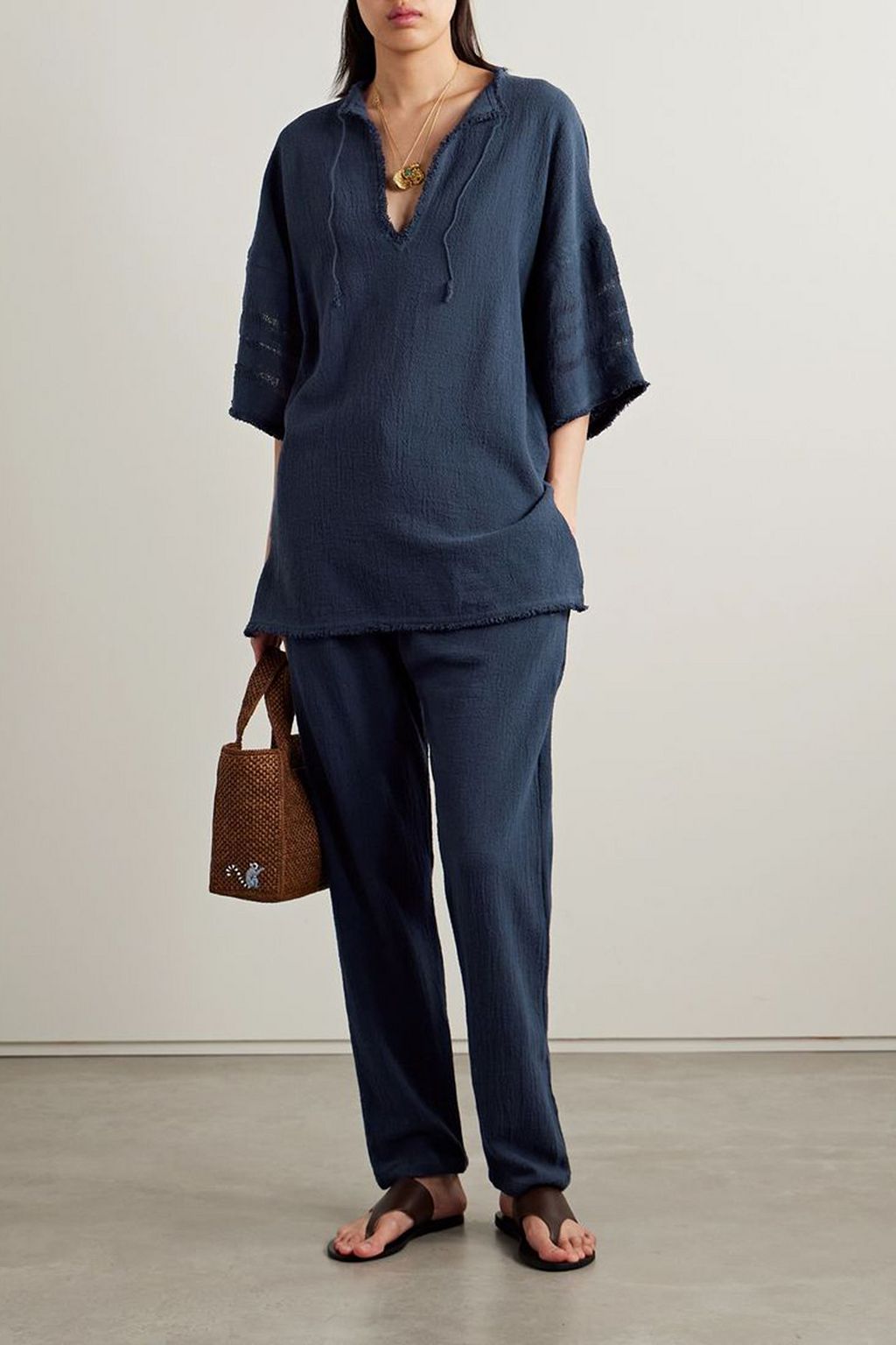 CARAVANA Wakun leather-trimmed distressed cotton-gauze track pants