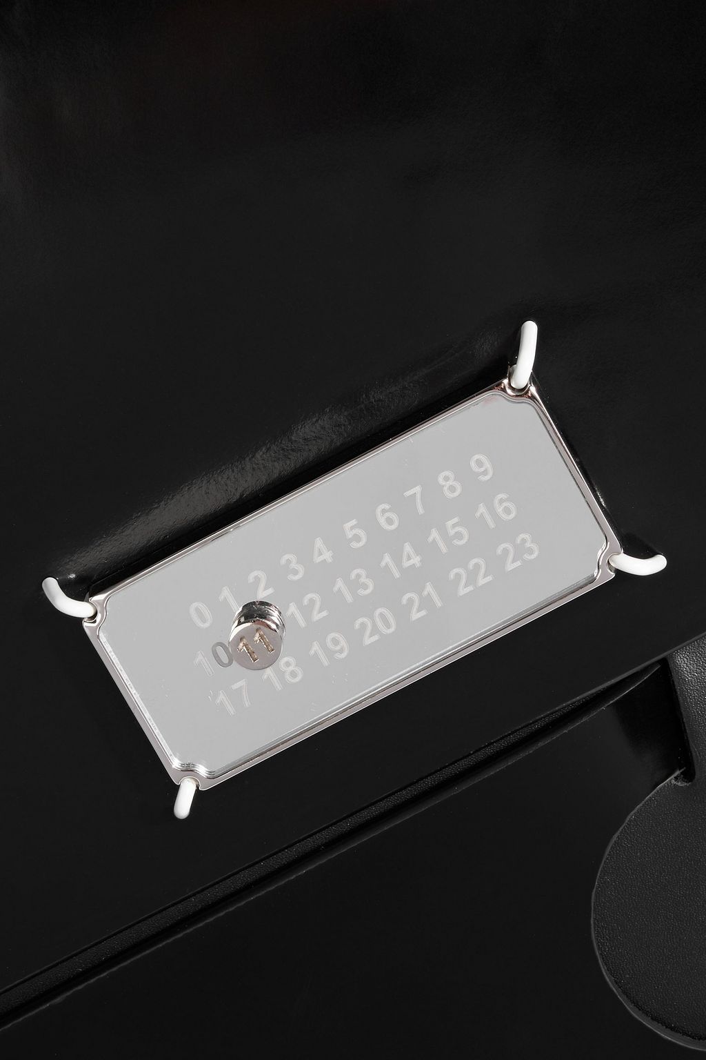 MAISON MARGIELA Snatched Classique glossed-leather clutch