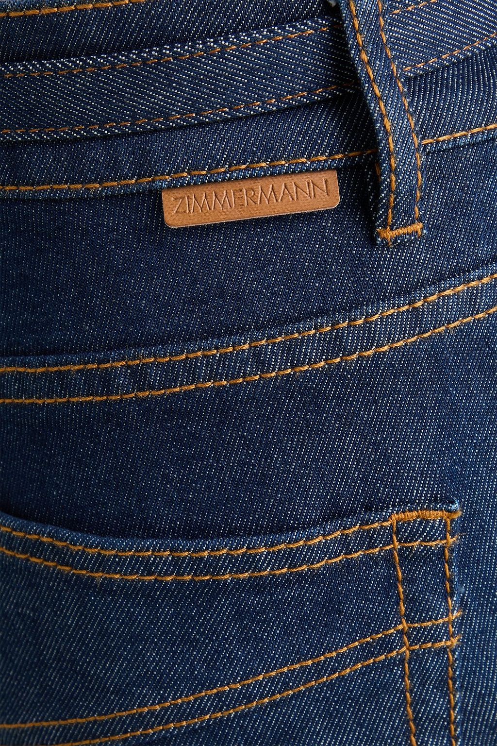 ZIMMERMANN Belted high-rise kick-flare jeans