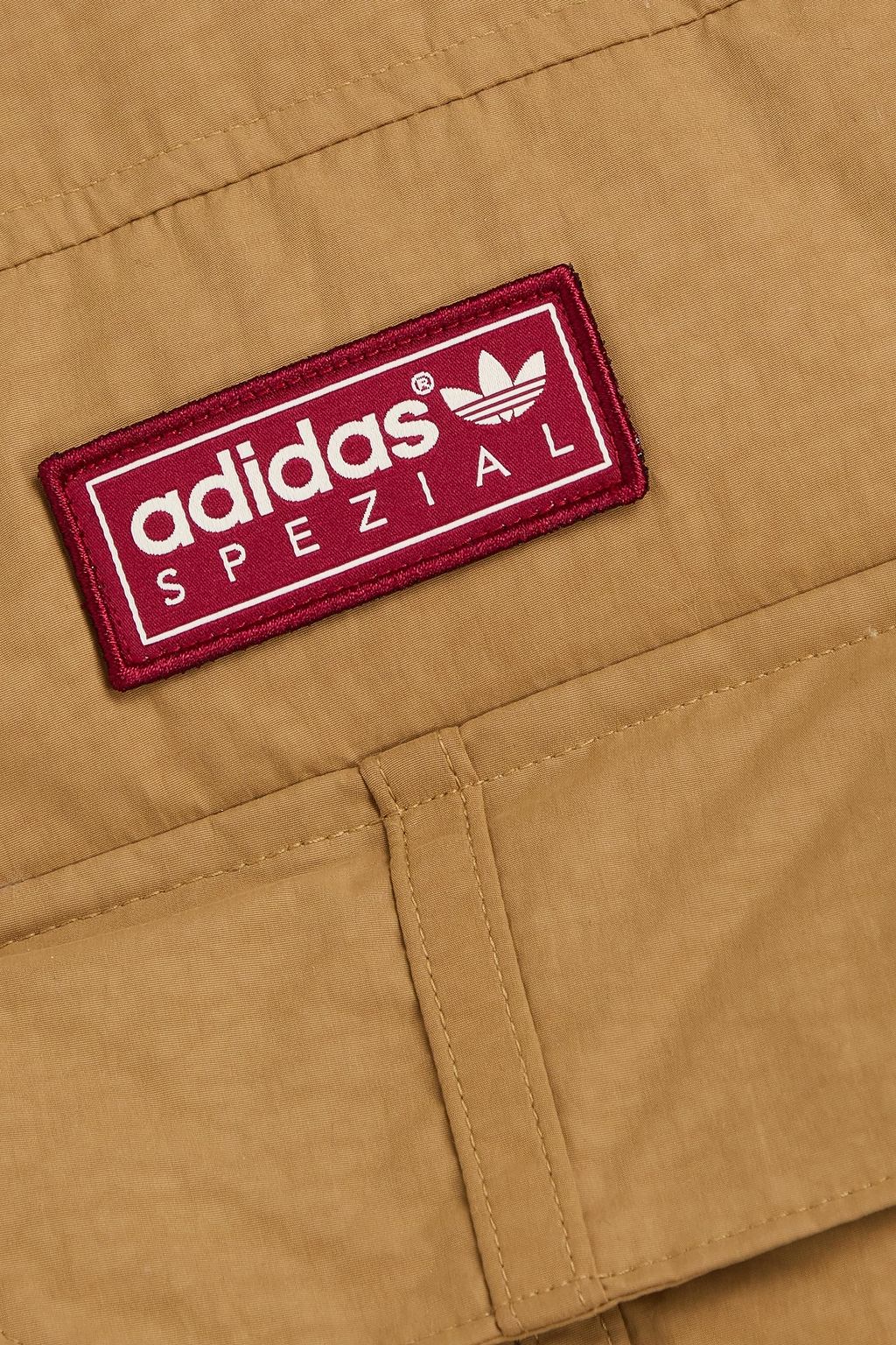 ADIDAS ORIGINALS X C.P. COMPANY معطف مبطّن من قماش عازل ومحشو بالزغب