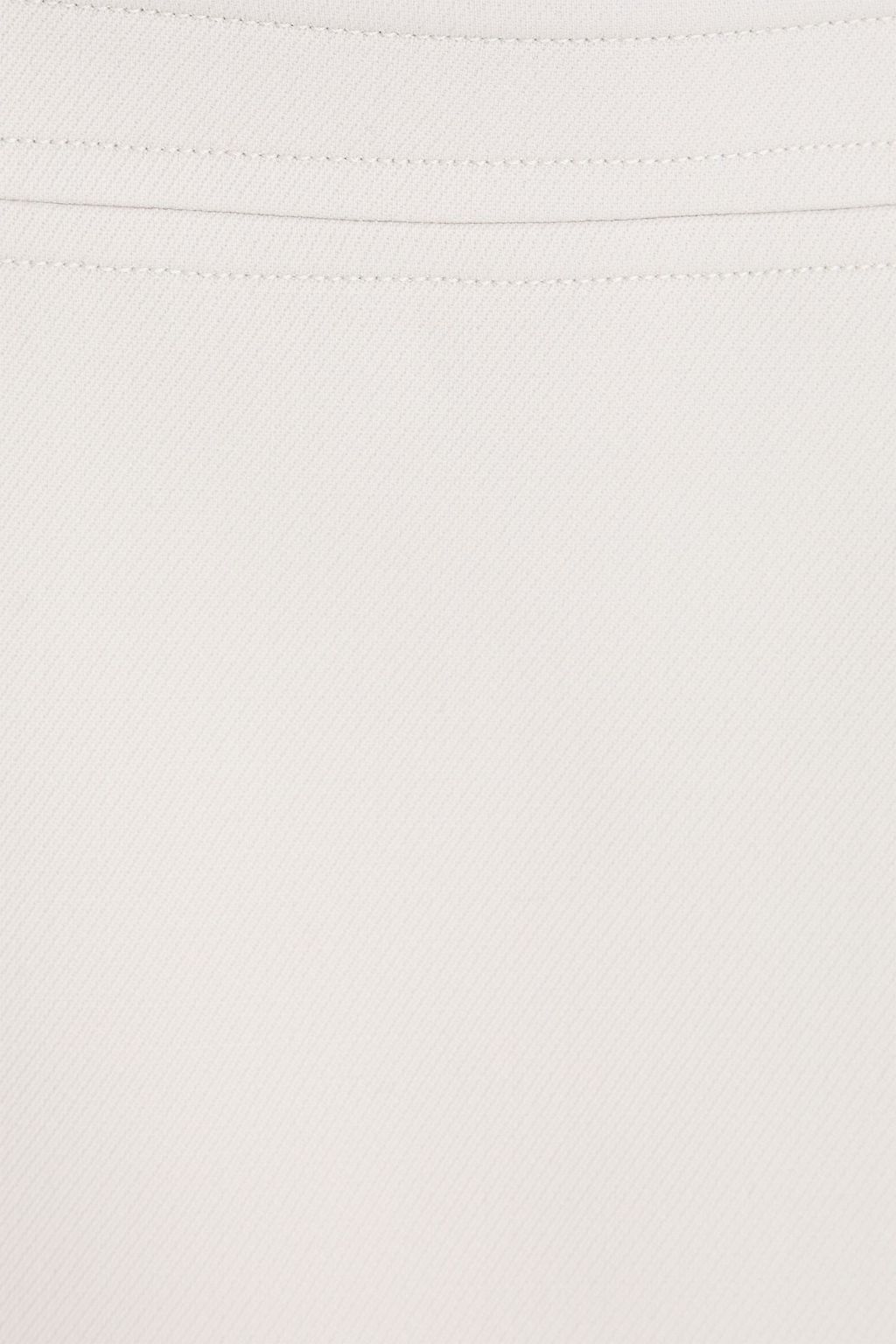 COURRÈGES Minirock aus Woll-Twill mit Cut-outs